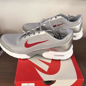 Nike Women’s Silver Sneakers with Red Swoosh